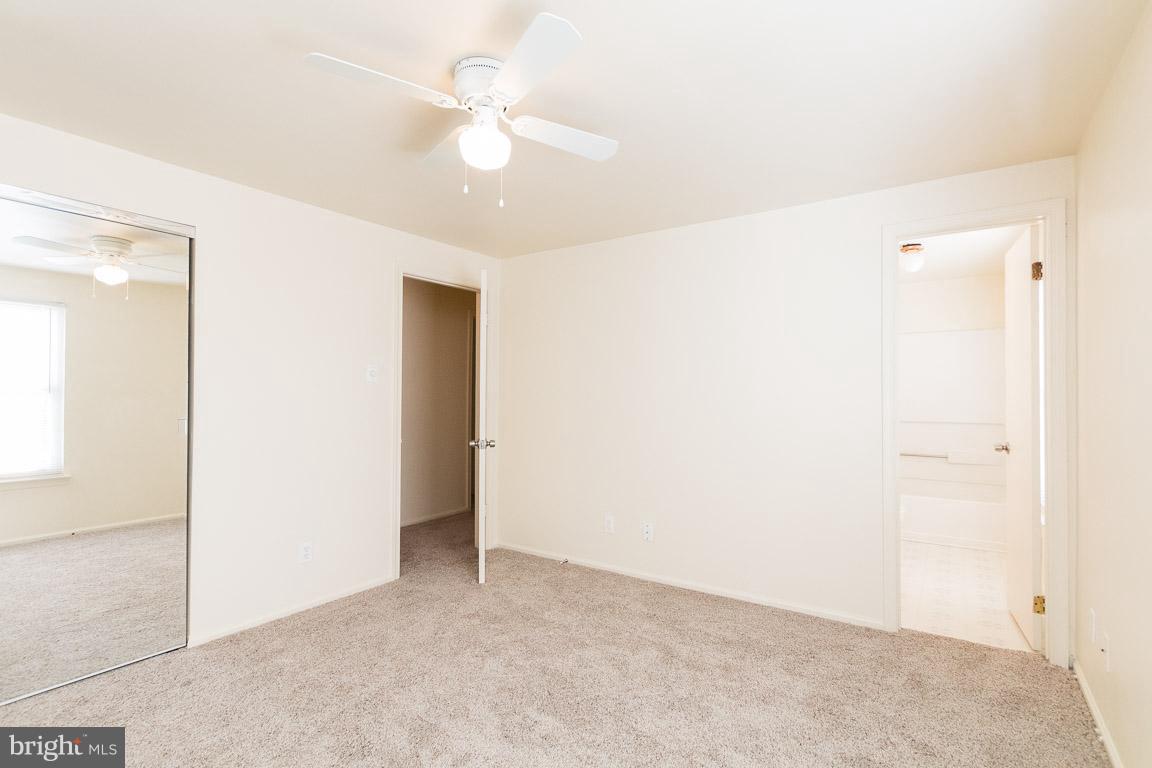 13006 Country Ridge Drive Germantown, MD 20874 - Photo 12 of 25 Master BR - Mirror Closet Door and Ceiing Fan
