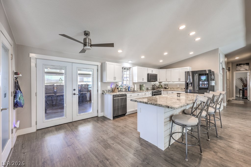 4375 Pinwheel Street Logandale, NV 89021 - Photo 9 of 52 Culinary aspirations meet contemporary design in this bright, well-appointed kitchen.