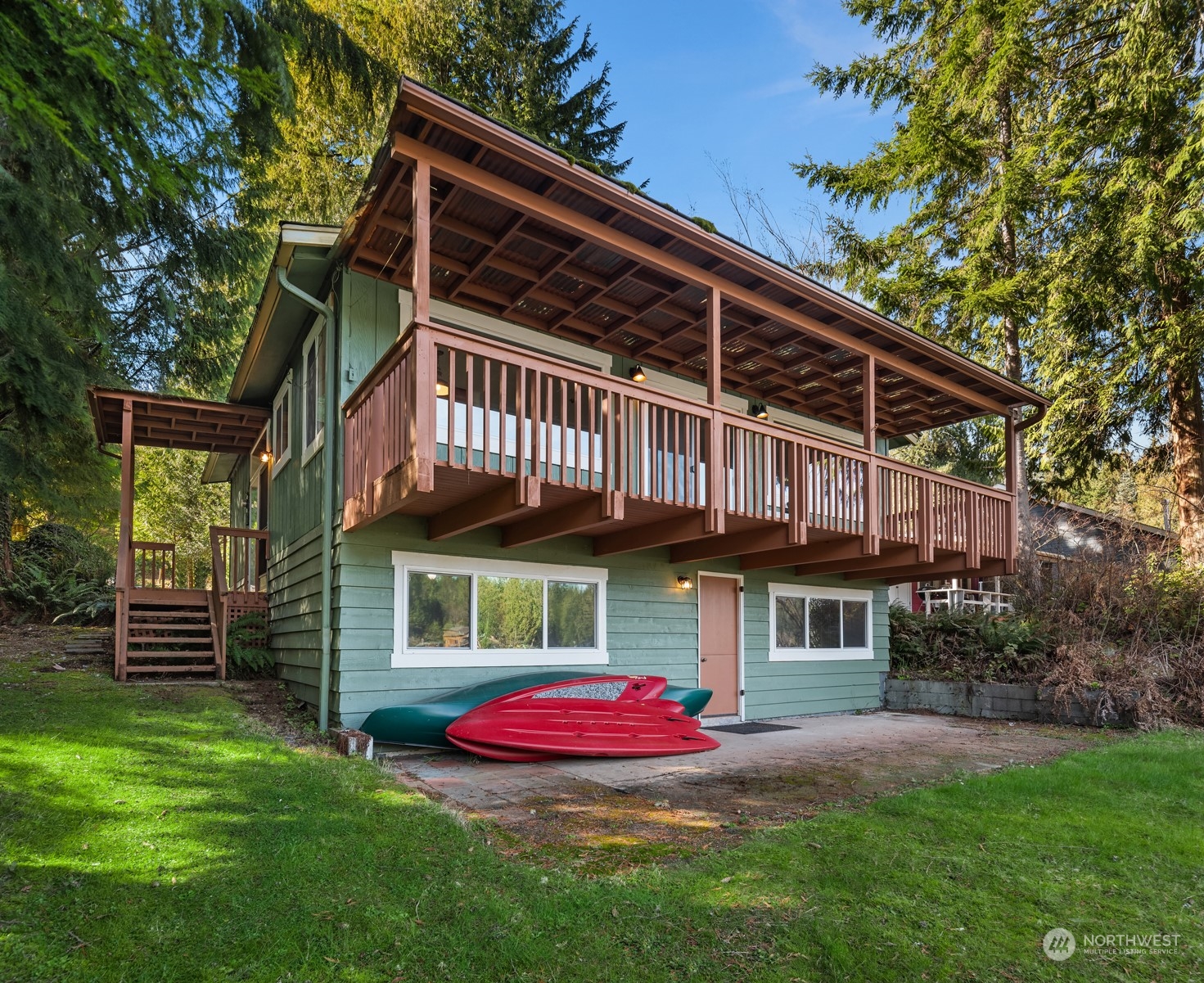 2631 Southwest Lake Roesiger Road Snohomish, WA 98290 - Photo 16 of 18 a view of a house with a sink and yard