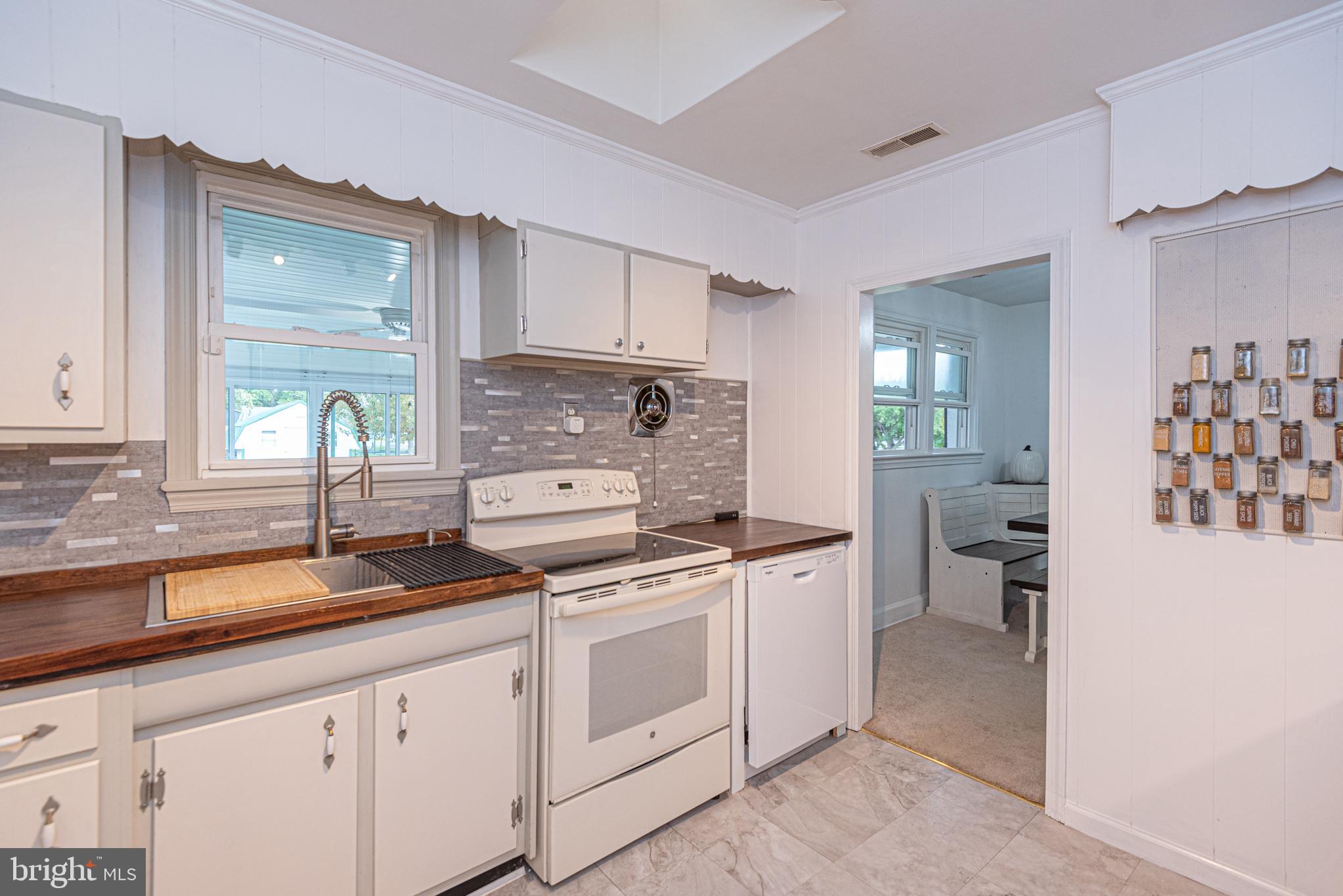 506 Park Avenue Ridgely, MD 21660 - Photo 15 of 59 a kitchen with a stove oven and sink