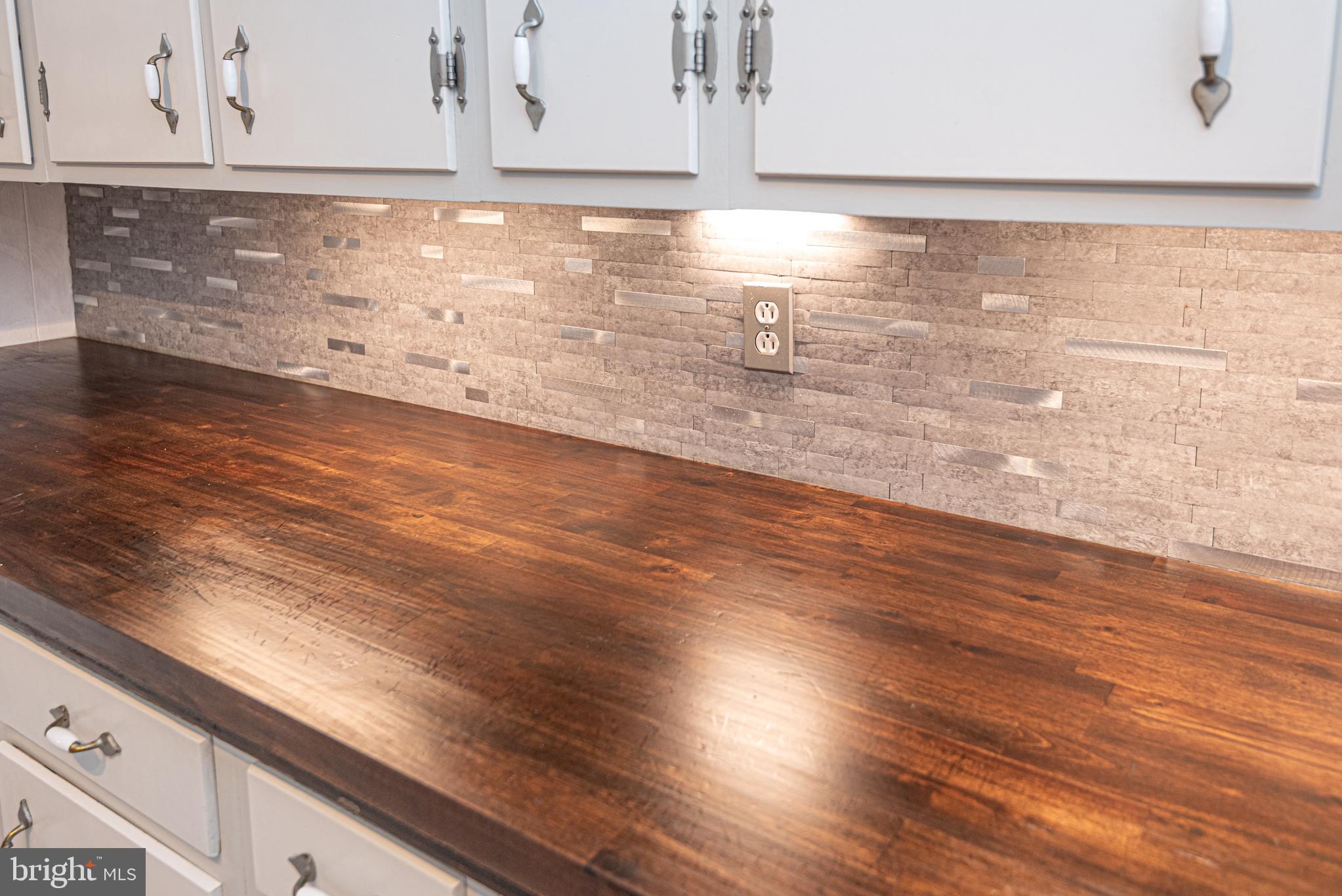 506 Park Avenue Ridgely, MD 21660 - Photo 18 of 59 a view of lot of microwave and cabinets