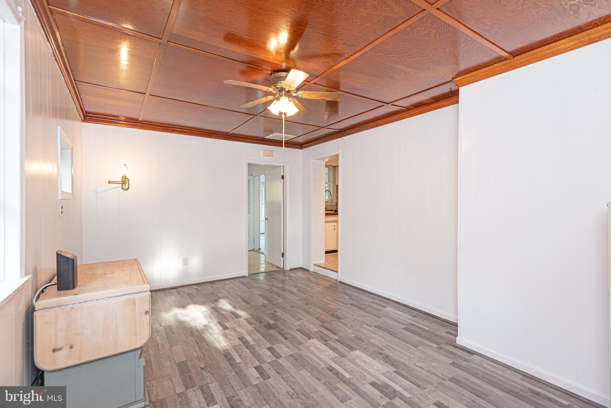 506 Park Avenue Ridgely, MD 21660 - Photo 20 of 59 a view of a livingroom with a ceiling fan and wooden floor