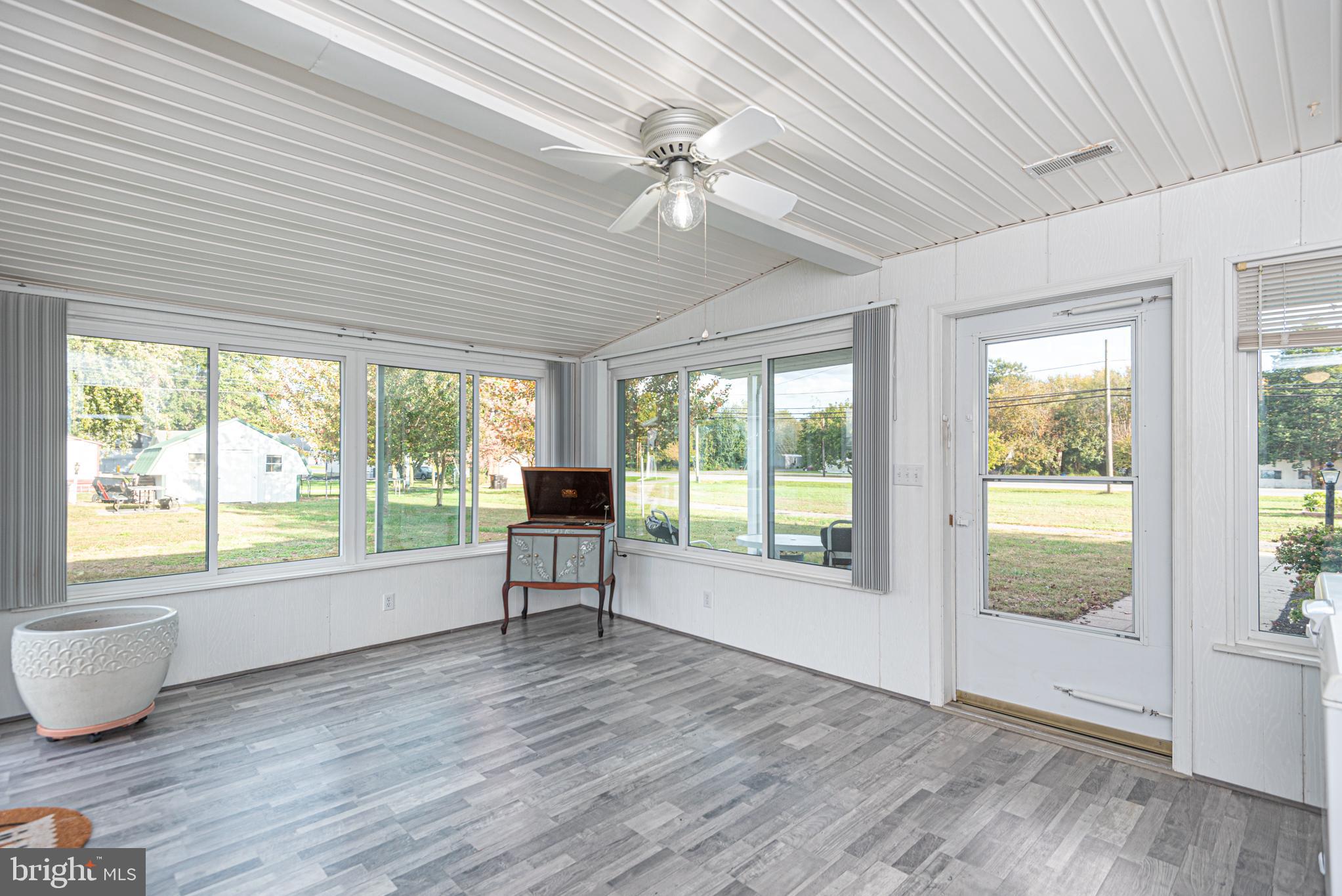 506 Park Avenue Ridgely, MD 21660 - Photo 24 of 59 a view of an empty room with wooden floor and a window