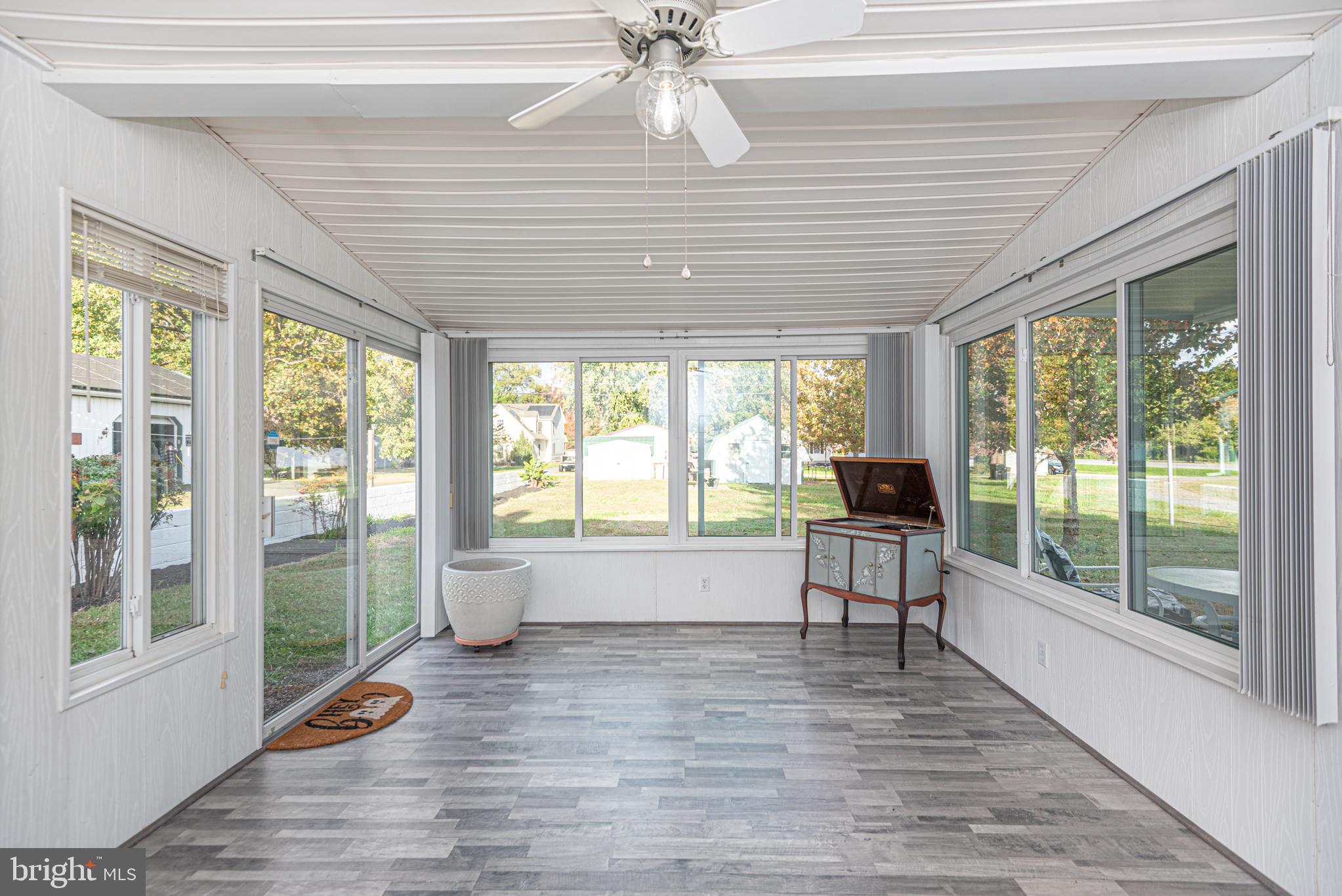 506 Park Avenue Ridgely, MD 21660 - Photo 25 of 59 a living room with wooden floor and a table