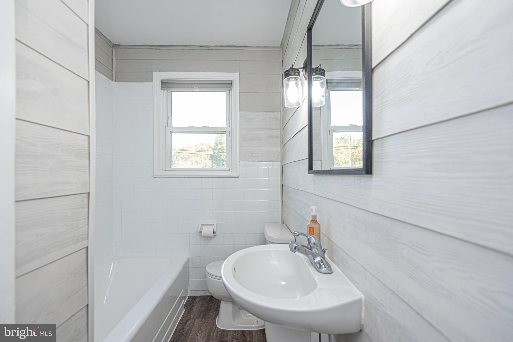 506 Park Avenue Ridgely, MD 21660 - Photo 31 of 59 a bathroom with a sink and a mirror