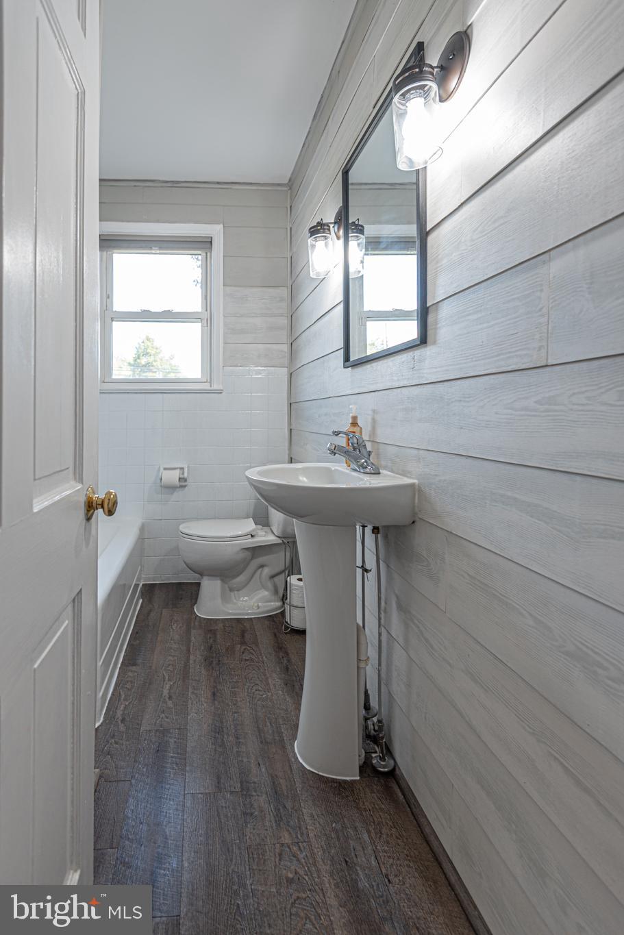 506 Park Avenue Ridgely, MD 21660 - Photo 32 of 59 a bathroom with a sink toilet and mirror