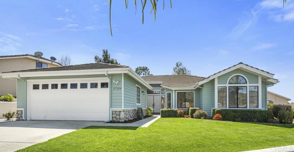 1729 Pinehurst Avenue Escondido, CA 92026 - Photo 1 of 29 a front view of a house with a yard