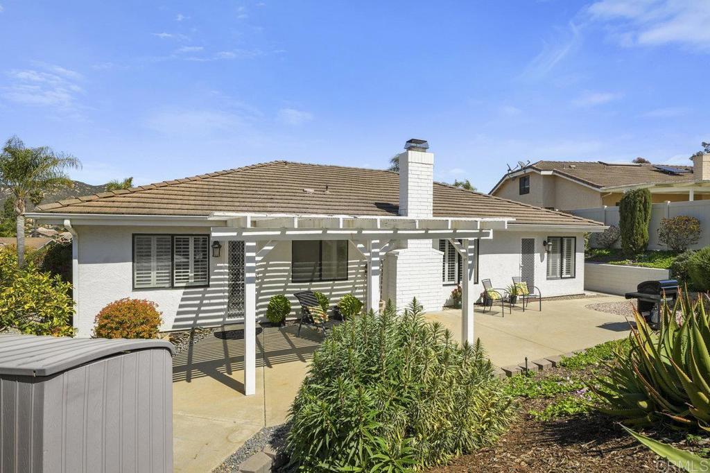 1729 Pinehurst Avenue Escondido, CA 92026 - Photo 14 of 29 a front view of a house with a yard