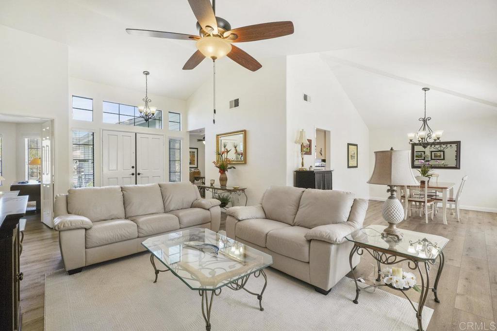 1729 Pinehurst Avenue Escondido, CA 92026 - Photo 2 of 29 a living room with furniture a ceiling fan and a chandelier