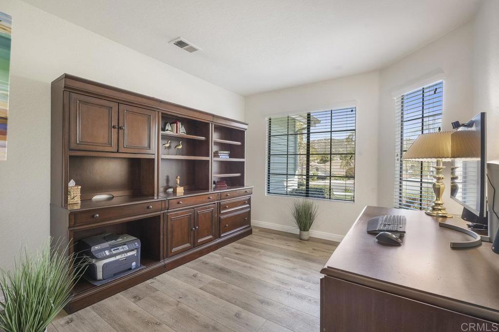 1729 Pinehurst Avenue Escondido, CA 92026 - Photo 25 of 29 a kitchen with a refrigerator stove and sink