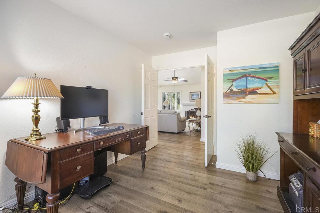 1729 Pinehurst Avenue Escondido, CA 92026 - Photo 26 of 29 a living room with furniture and a flat screen tv
