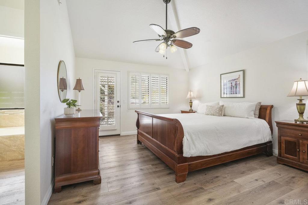 1729 Pinehurst Avenue Escondido, CA 92026 - Photo 5 of 29 a bedroom with a bed and wooden floor