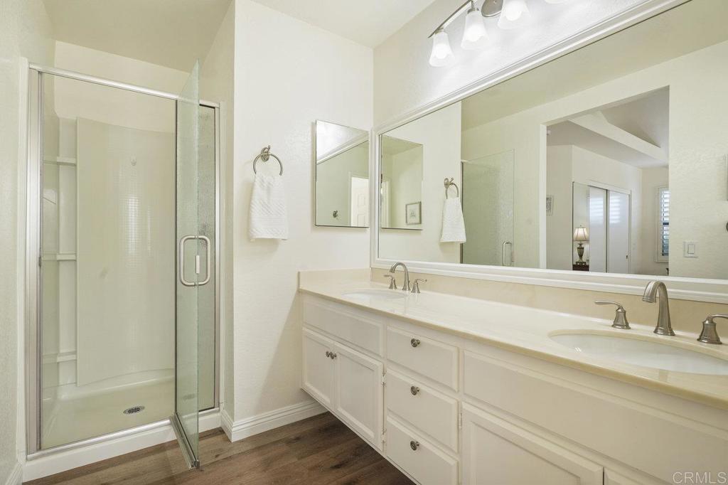 1729 Pinehurst Avenue Escondido, CA 92026 - Photo 6 of 29 a bathroom with a double vanity sink mirror and shower