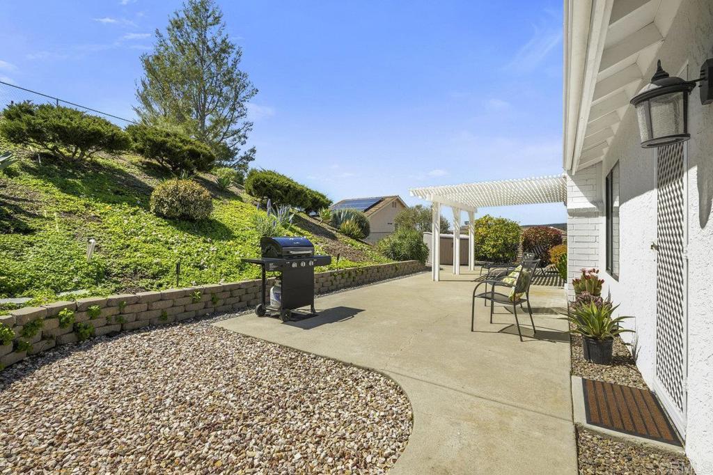 1729 Pinehurst Avenue Escondido, CA 92026 - Photo 8 of 29 a view of a bench in a patio