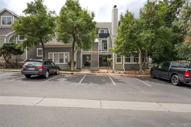 a car parked in front of a house