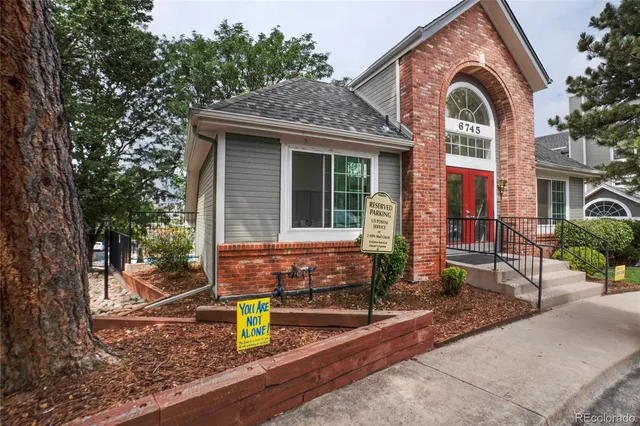a front view of a house with garage