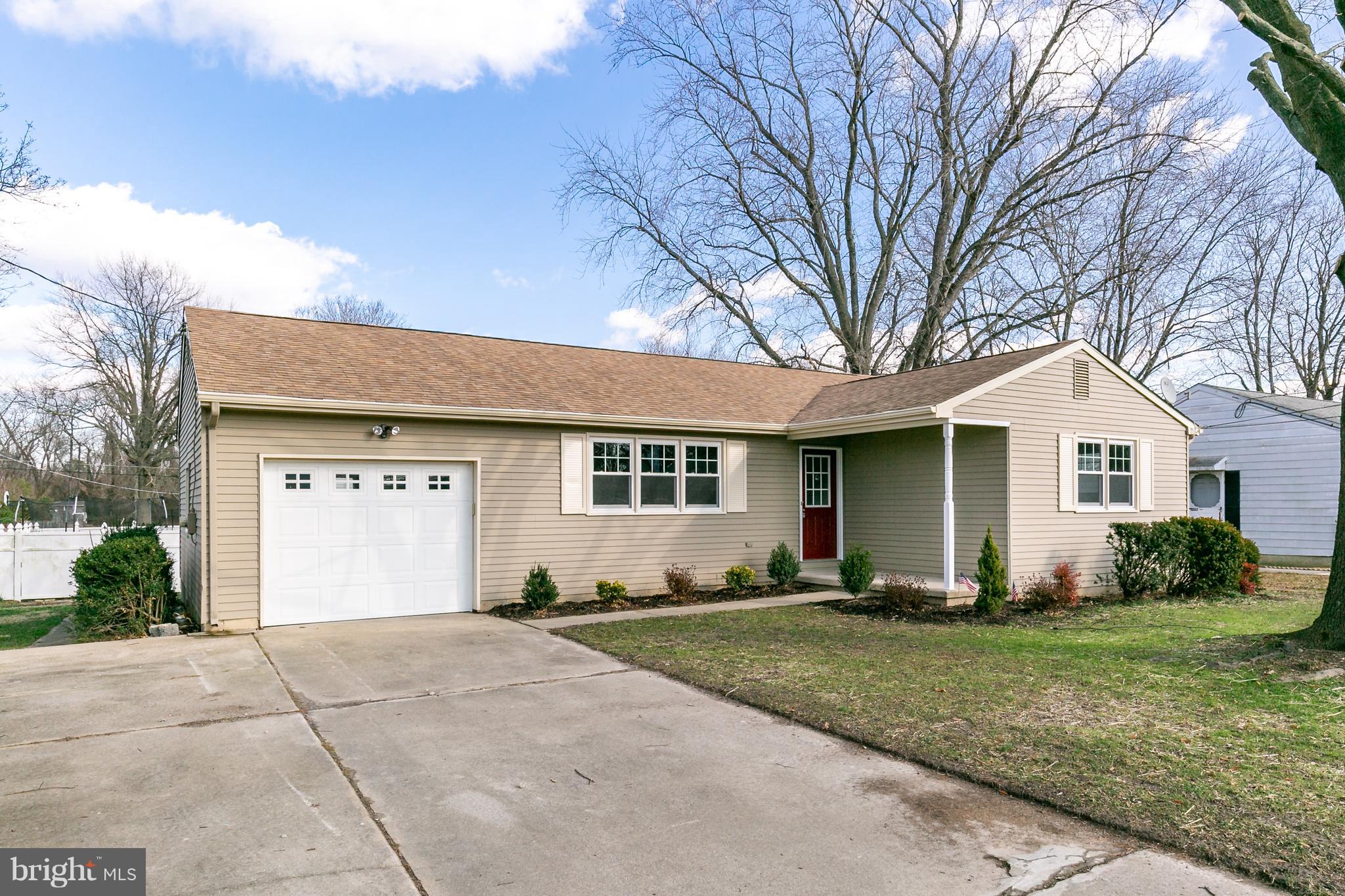 126 Eaton Road Pennsville, NJ 08070 - Photo 1 of 29 a front view of house with garage