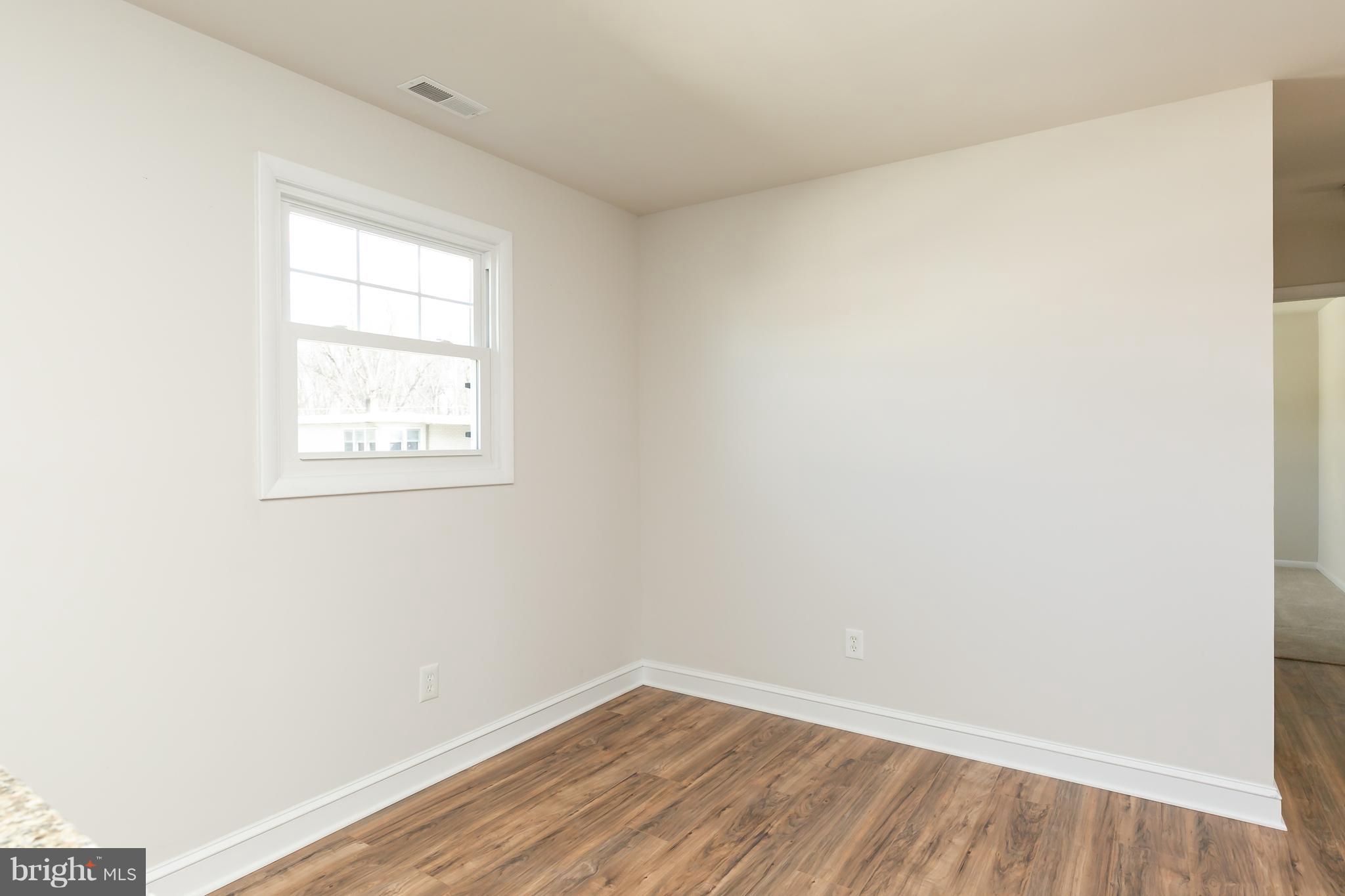 126 Eaton Road Pennsville, NJ 08070 - Photo 17 of 29 an empty room with a window