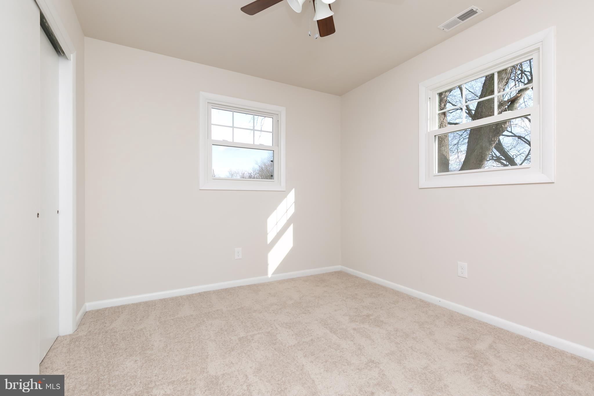 126 Eaton Road Pennsville, NJ 08070 - Photo 22 of 29 an empty room with windows
