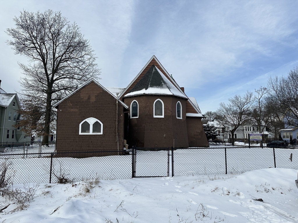201 King Street Springfield, MA 01109 - Photo 5 of 12 a house with trees in the background