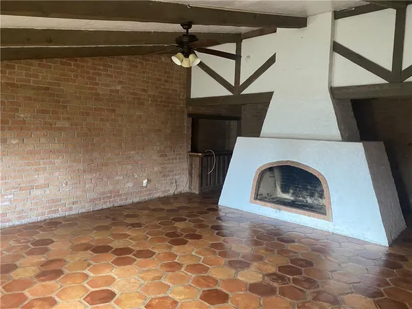 a view of a livingroom with a fireplace