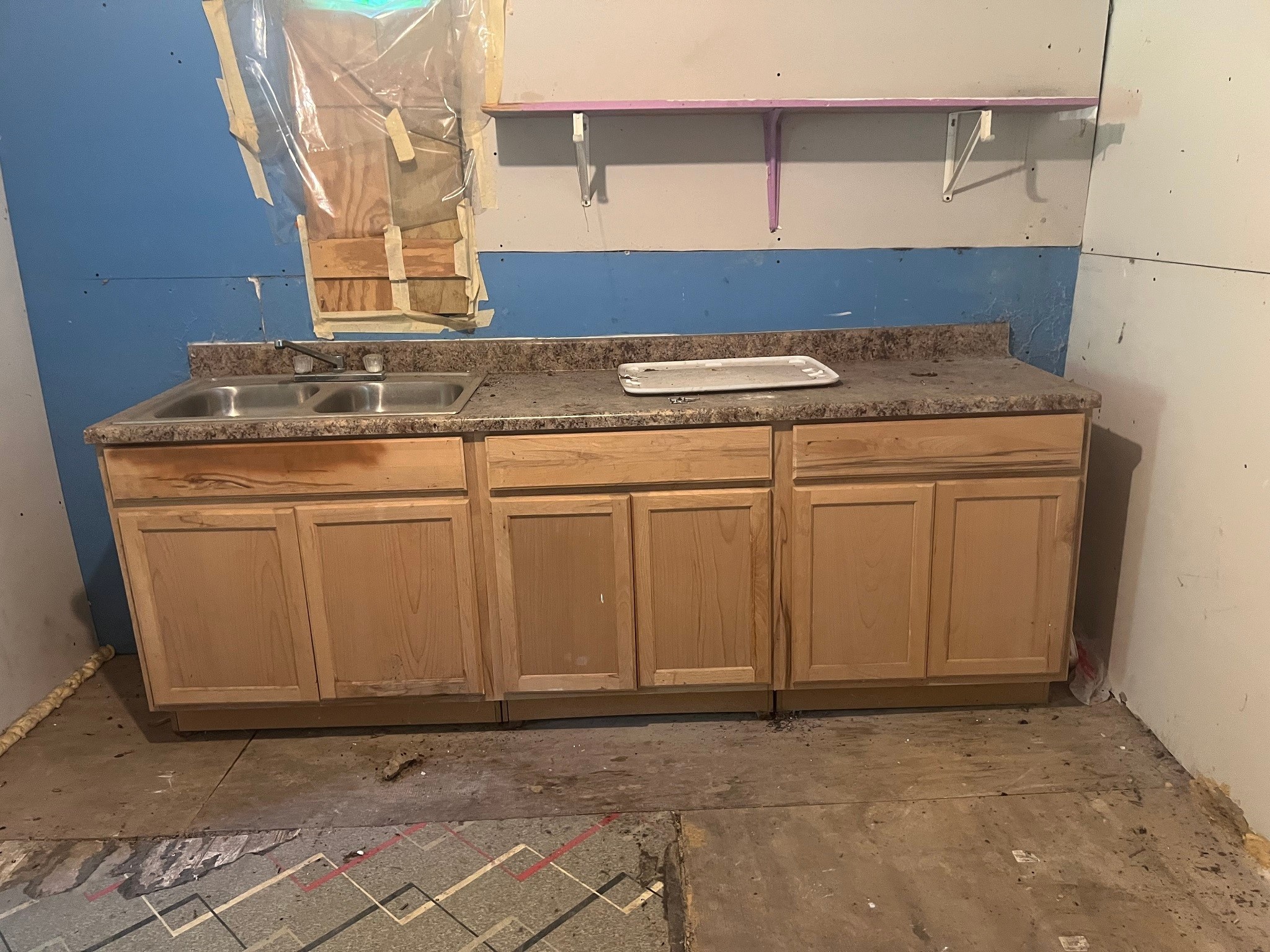 611 Danover Road Katy, TX 77494 - Photo 11 of 22 a kitchen with granite countertop a sink and a stove