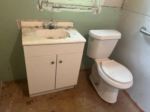 a bathroom with a shower and a tub