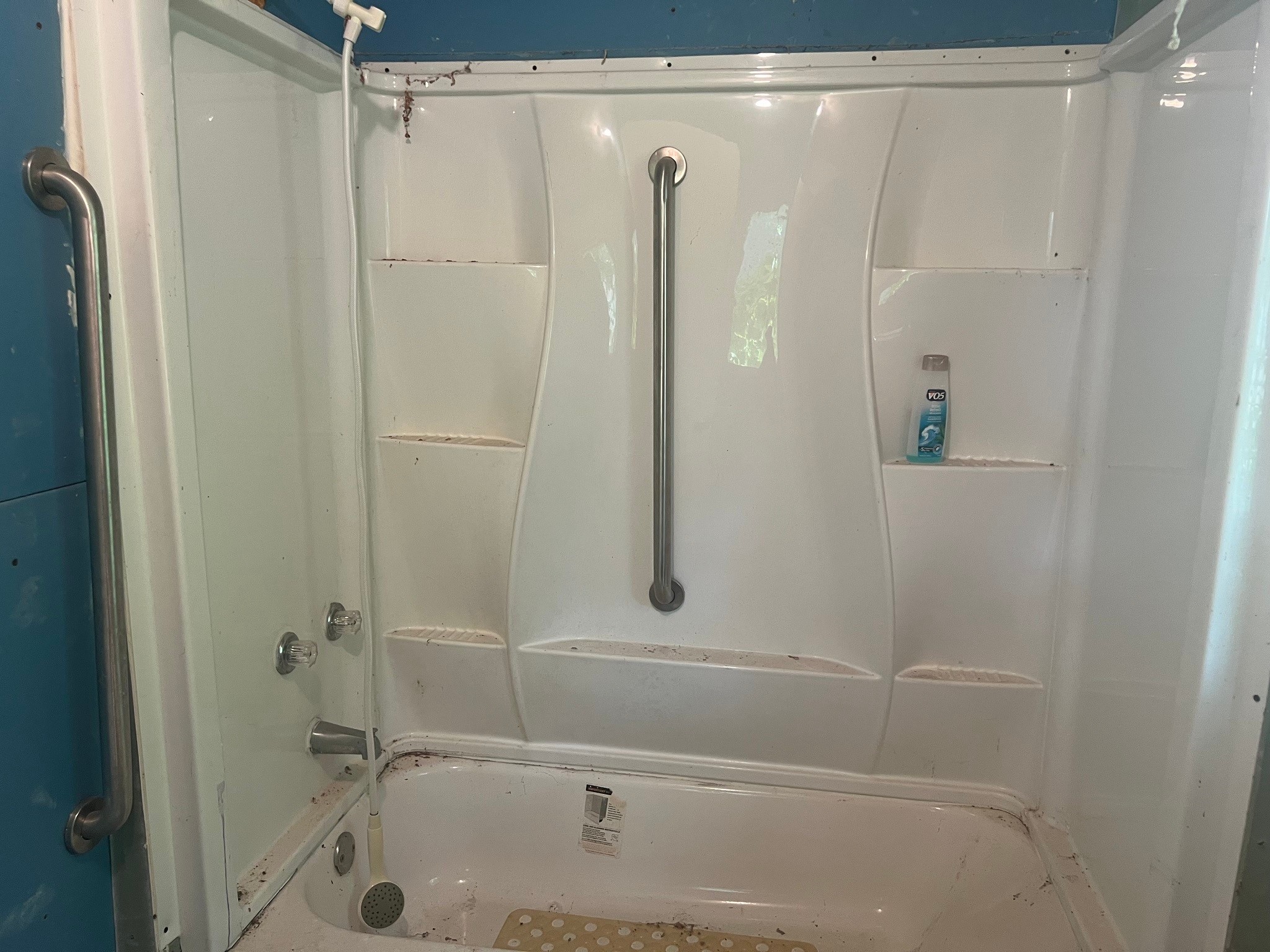 611 Danover Road Katy, TX 77494 - Photo 14 of 22 a bathroom with a shower and a tub