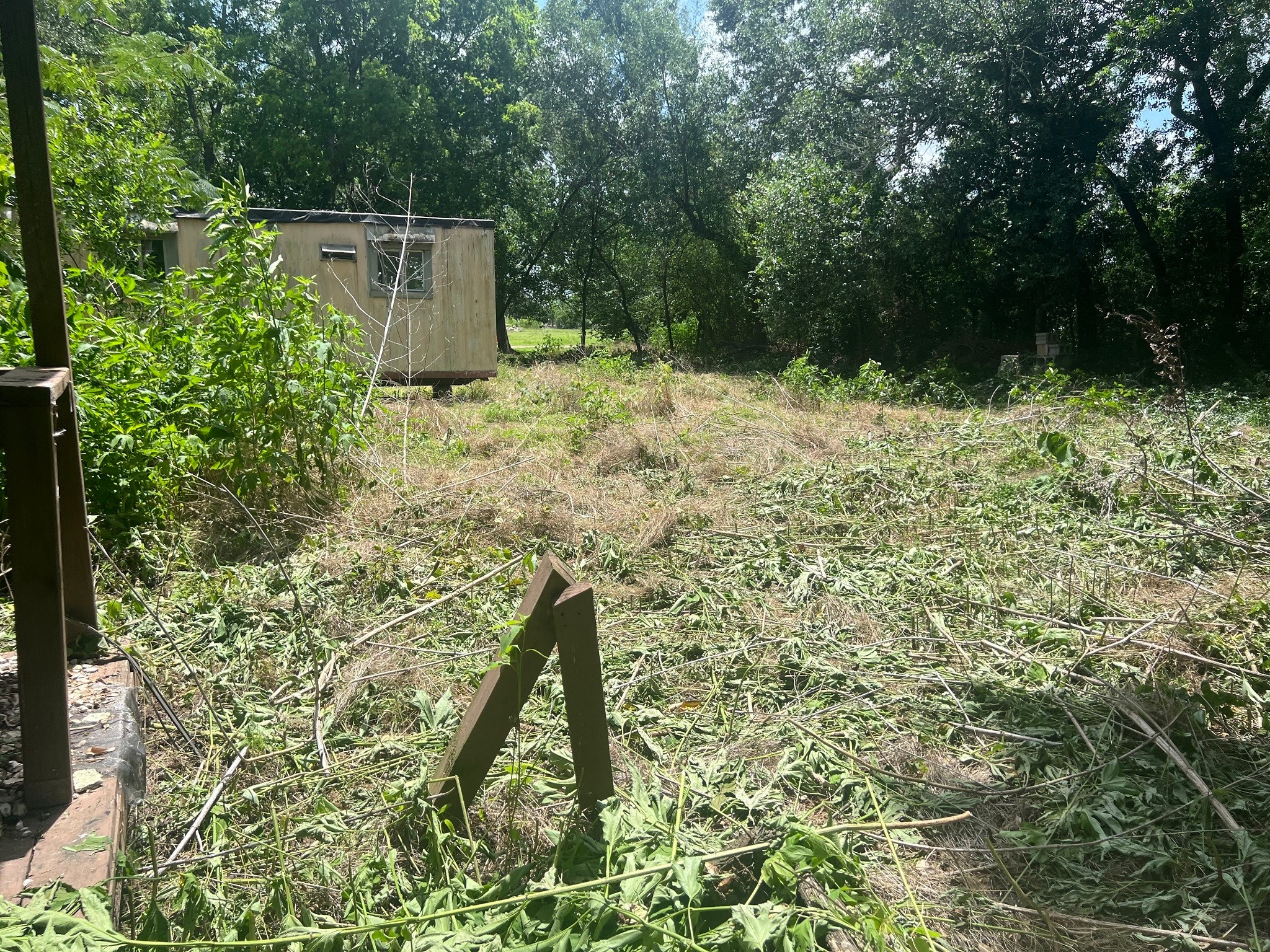 611 Danover Road Katy, TX 77494 - Photo 6 of 22 a backyard of a house with lots of green space and wooden fence