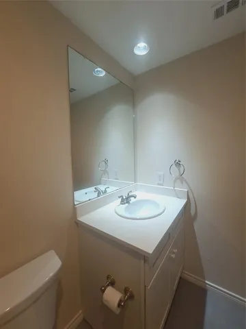 a bathroom with a sink and a toilet