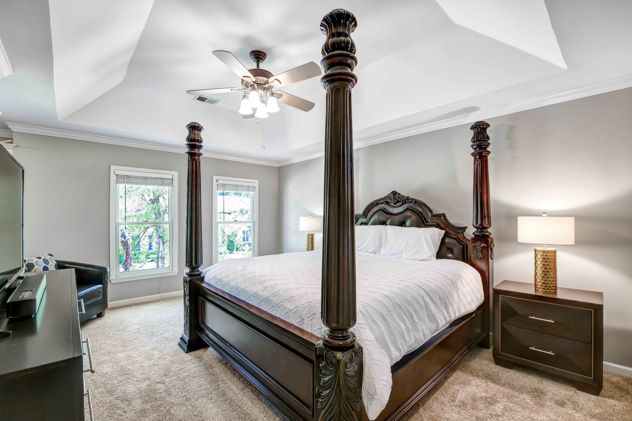 4845 Manassas Drive Brentwood, TN 37027 - Photo 12 of 22 a bedroom with a bed and a chandelier