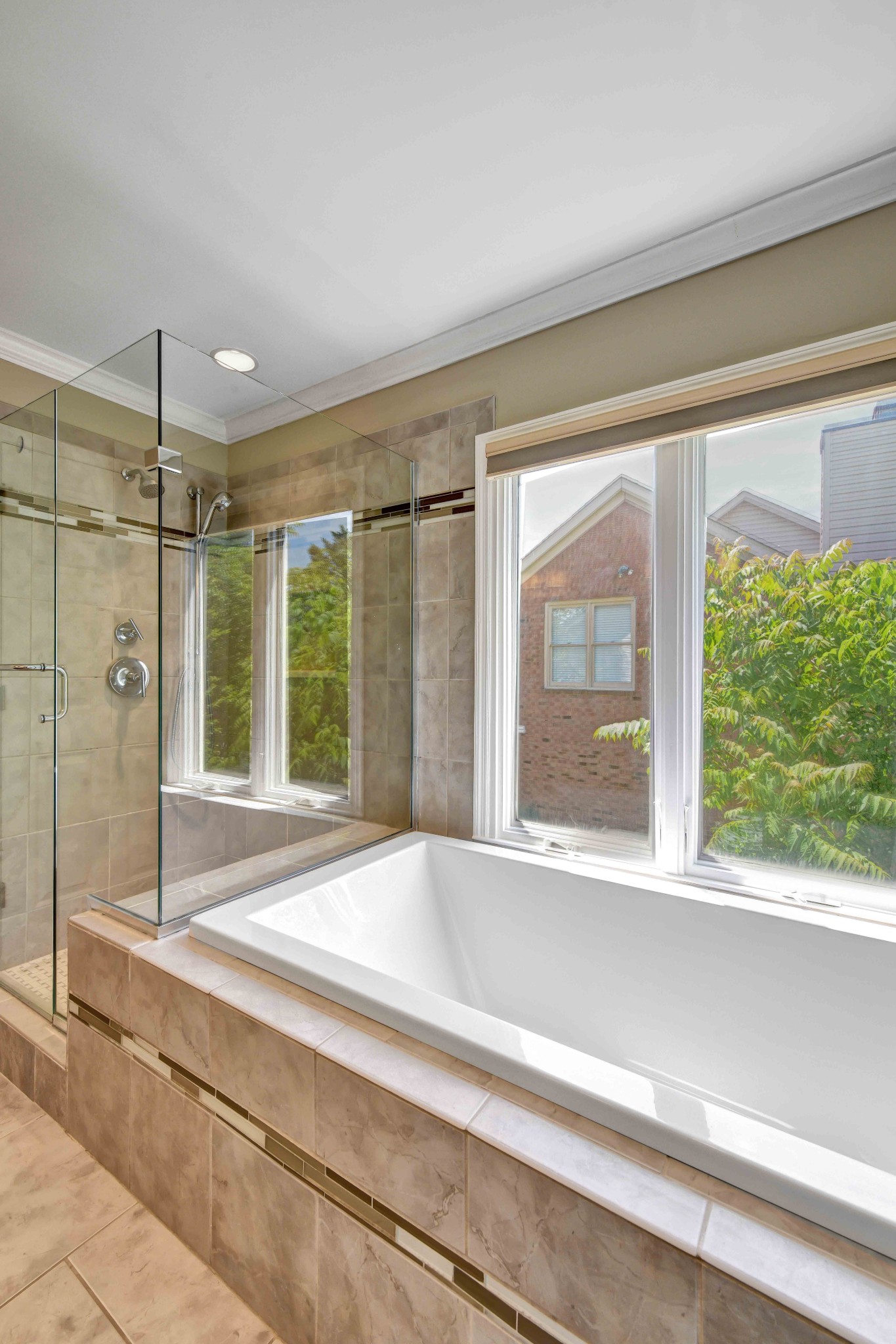 4845 Manassas Drive Brentwood, TN 37027 - Photo 15 of 22 a living room with a large window and a chandelier
