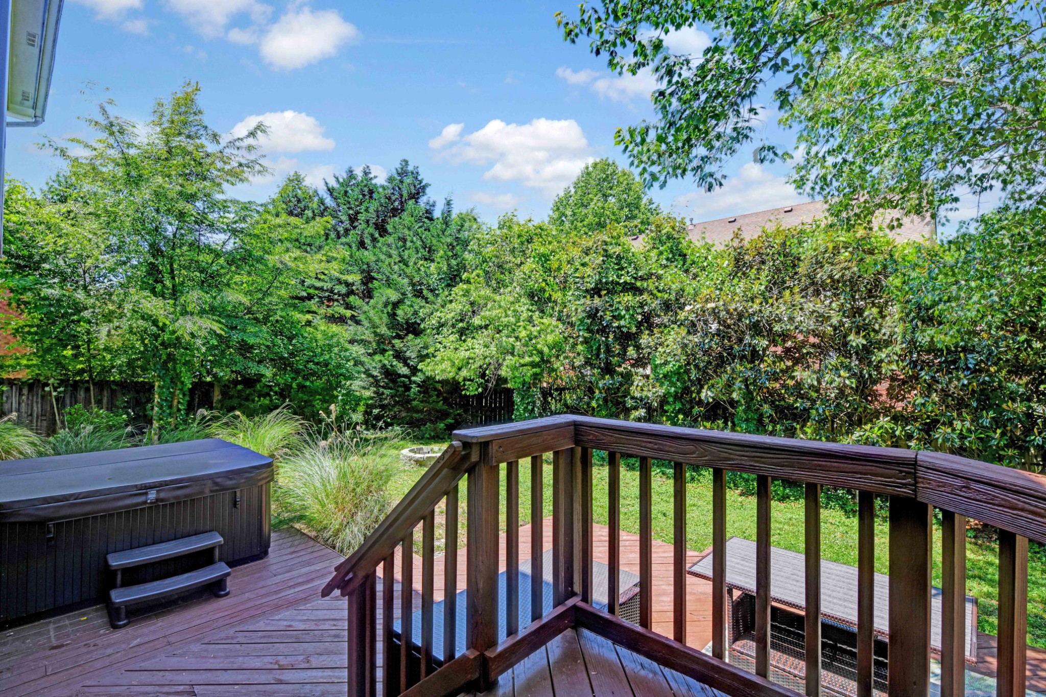 4845 Manassas Drive Brentwood, TN 37027 - Photo 19 of 22 a view of a balcony with wooden floor and fence