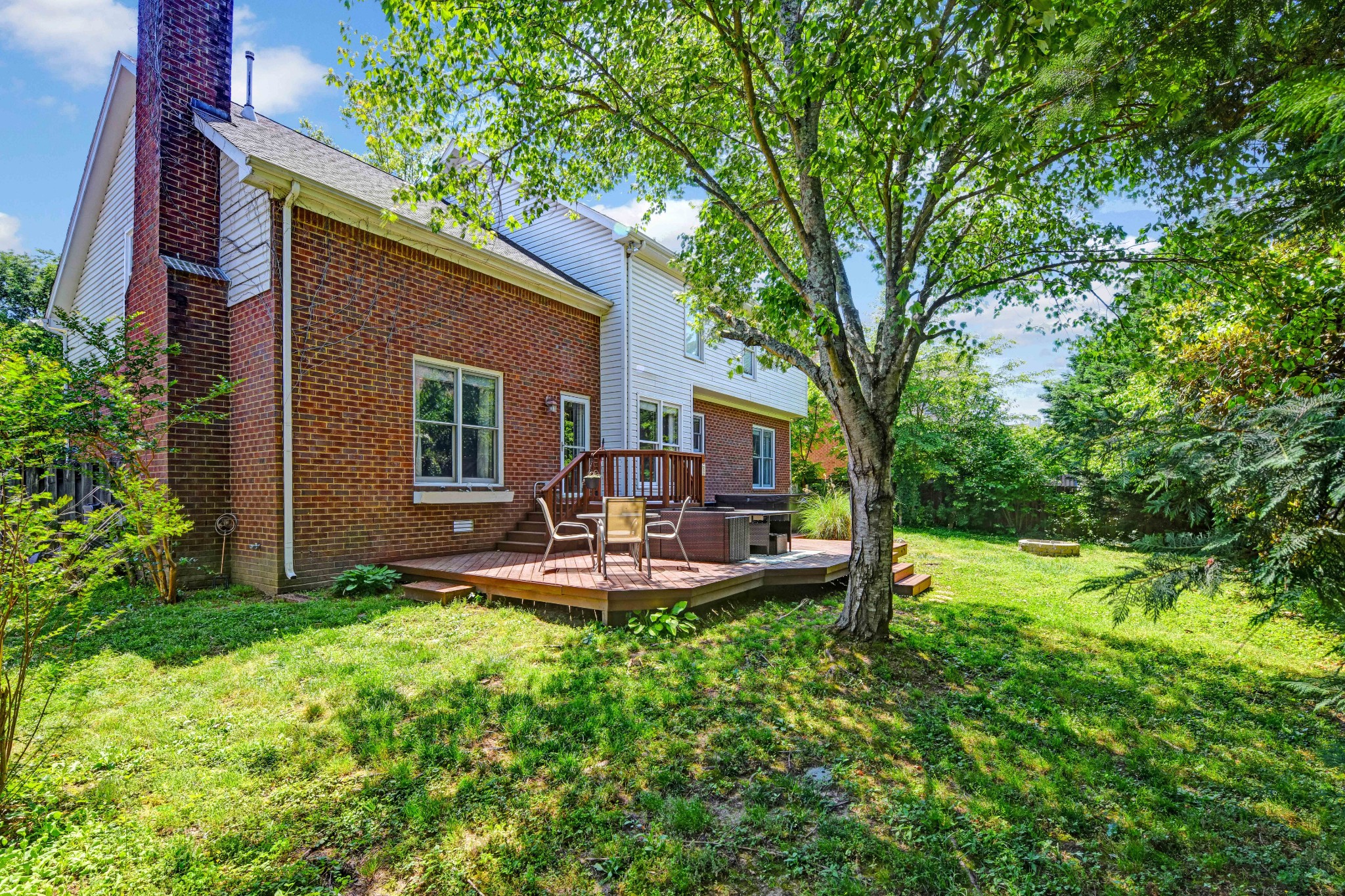 4845 Manassas Drive Brentwood, TN 37027 - Photo 22 of 22 a view of a house with backyard and sitting area