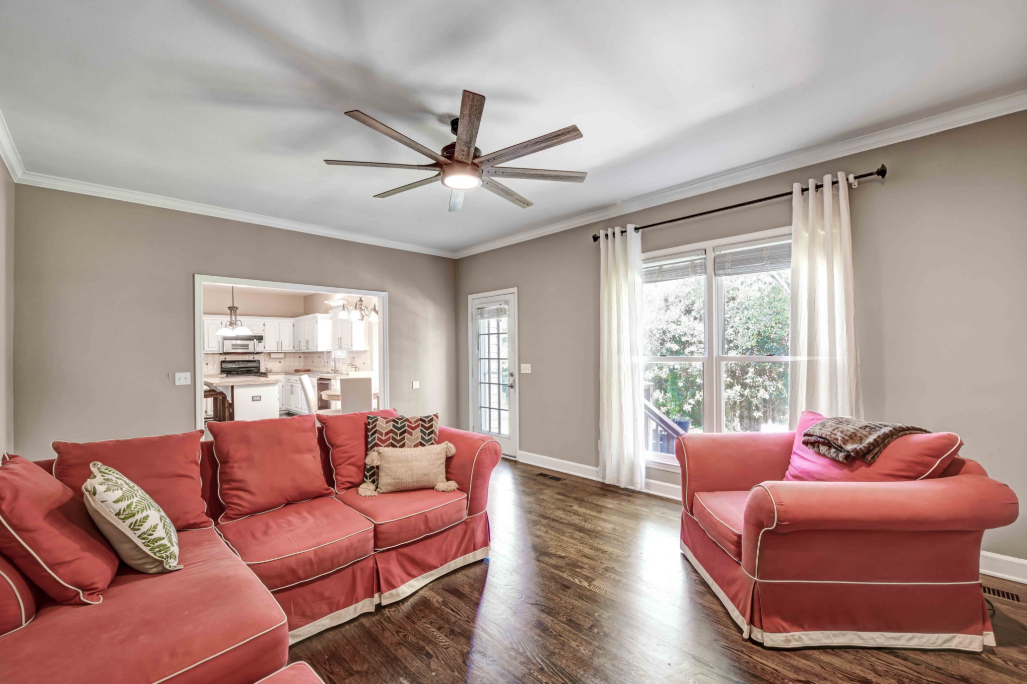4845 Manassas Drive Brentwood, TN 37027 - Photo 8 of 22 a living room with furniture a ceiling fan and a window