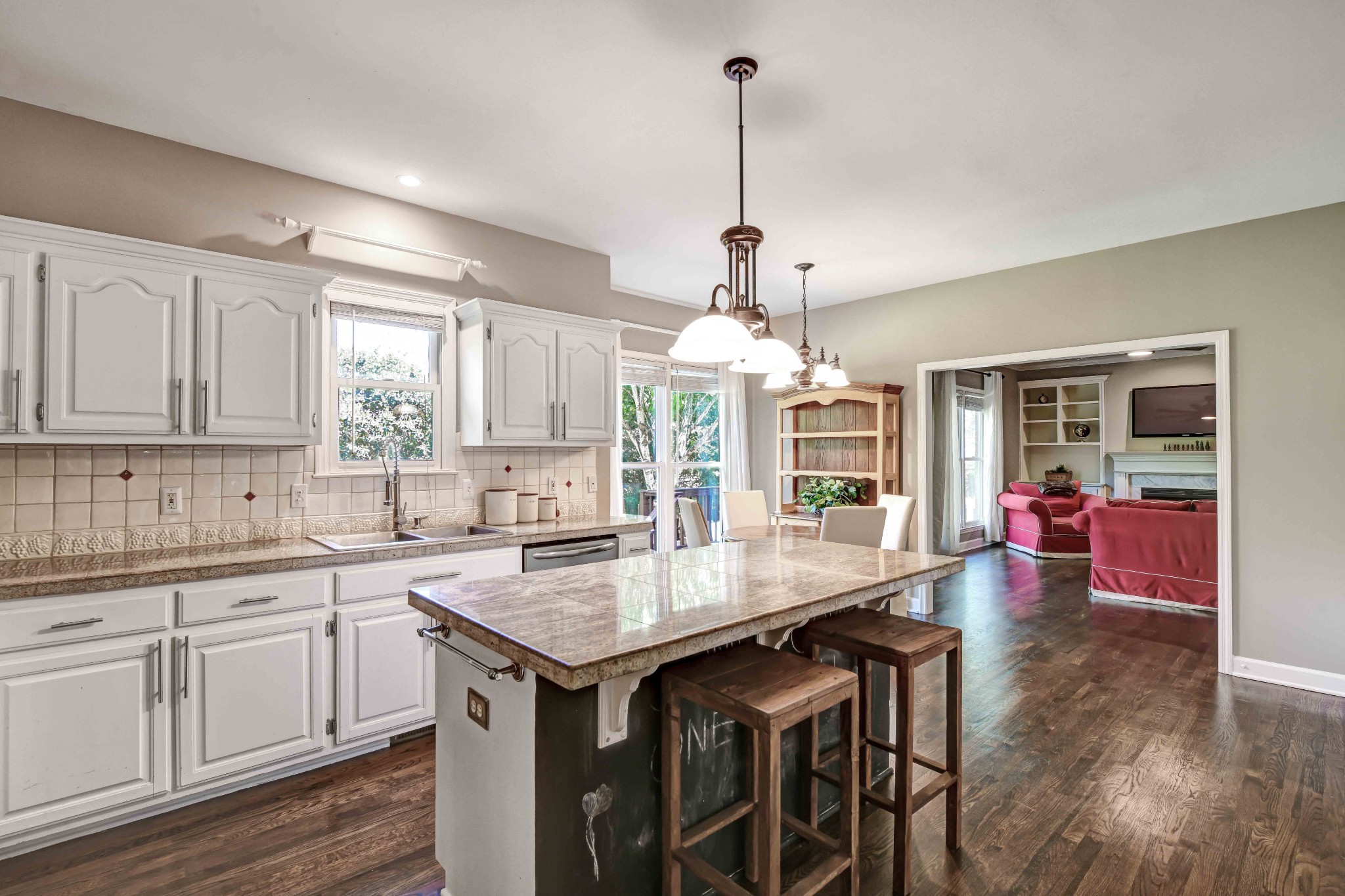 4845 Manassas Drive Brentwood, TN 37027 - Photo 10 of 22 a kitchen with granite countertop center island and stainless steel appliances