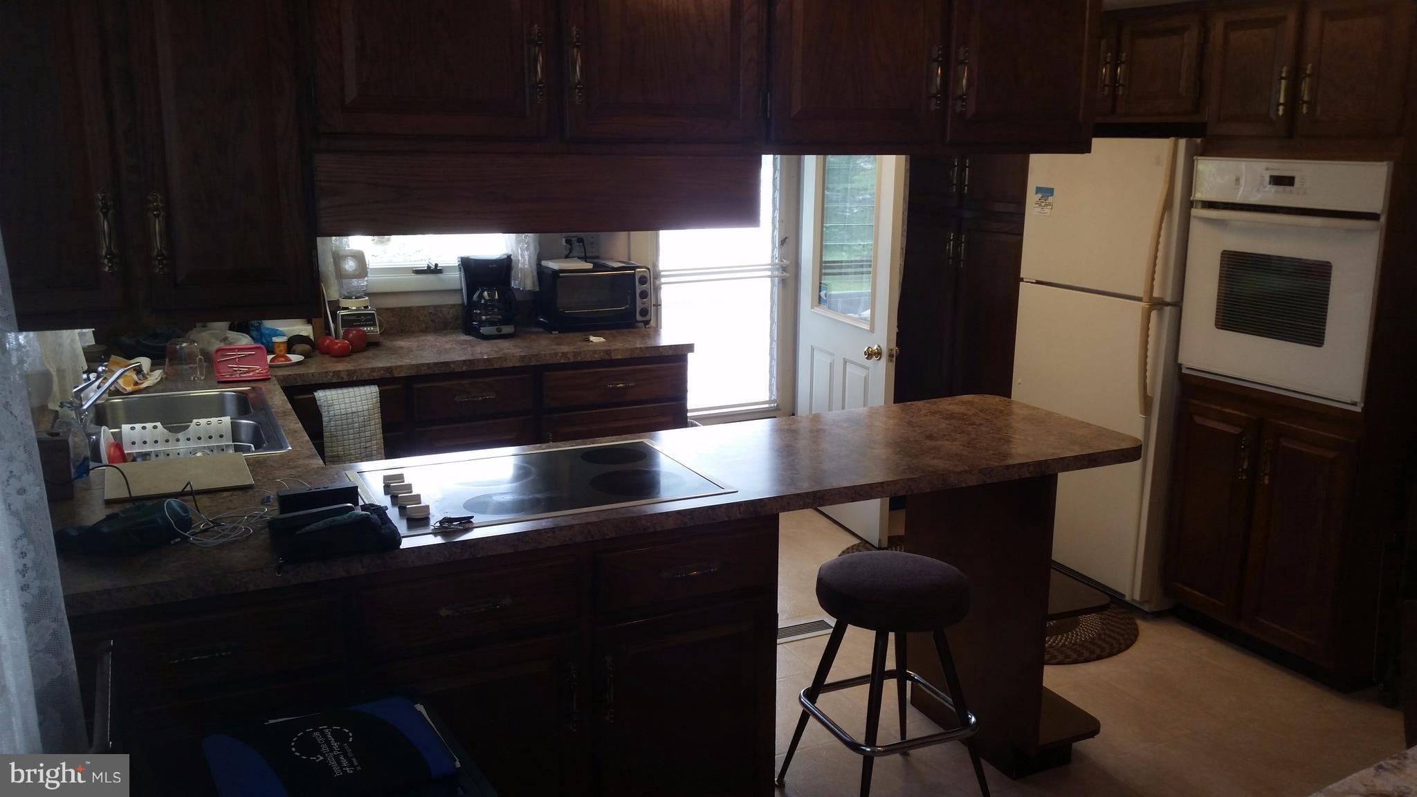 14804 Winchester Road Southwest Cresaptown, MD 21502 - Photo 16 of 30 Large kitchen/dining combo fits full size table