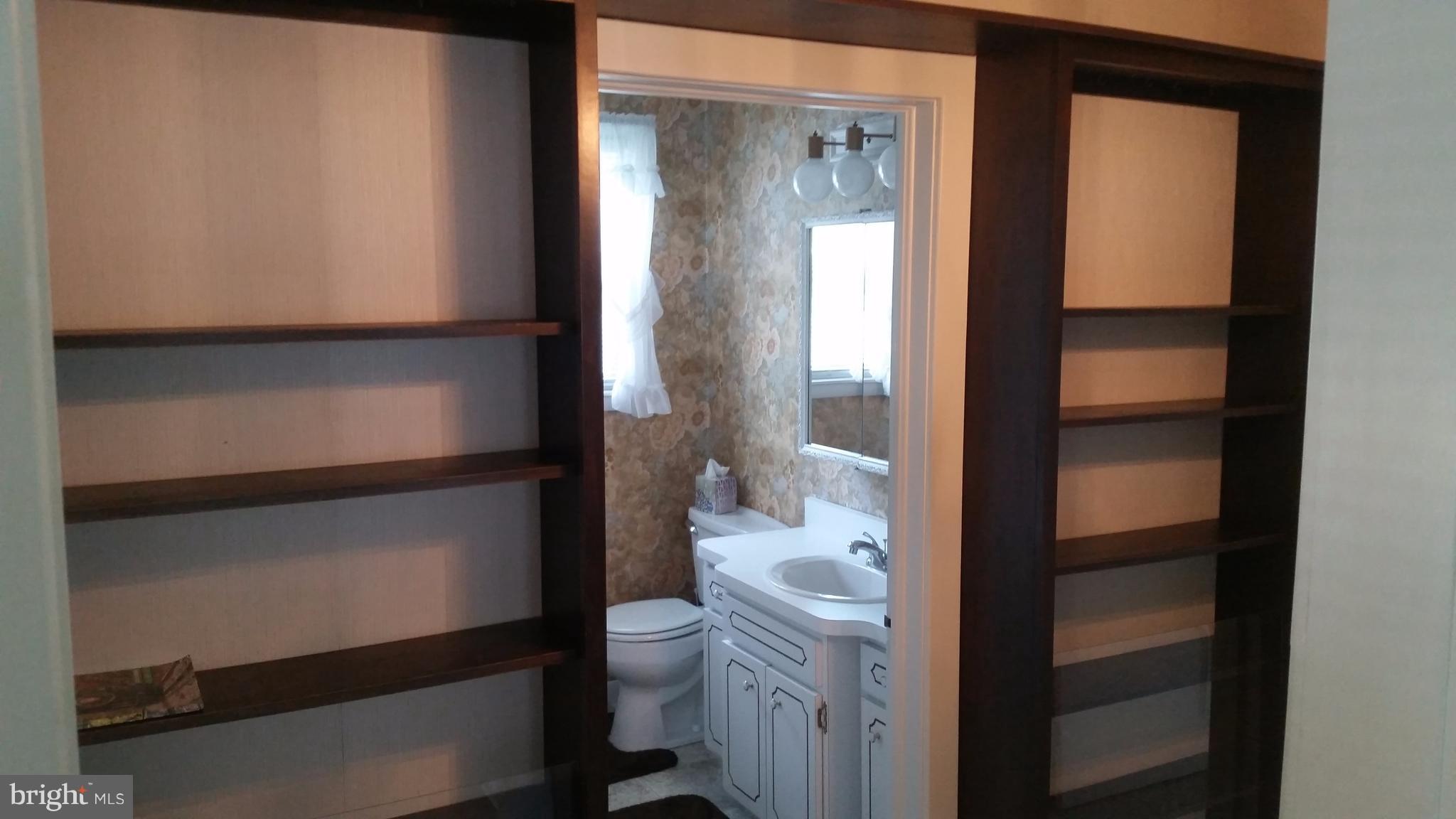 14804 Winchester Road Southwest Cresaptown, MD 21502 - Photo 21 of 30 hallway with built ins
