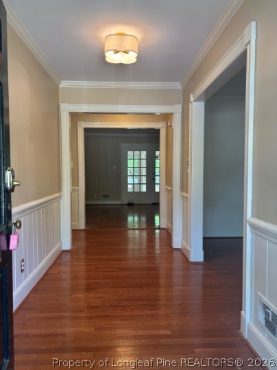 1513 Raeford Road Fayetteville, NC 28305 - Photo 2 of 25 a view of a hallway with wooden floor and a living room