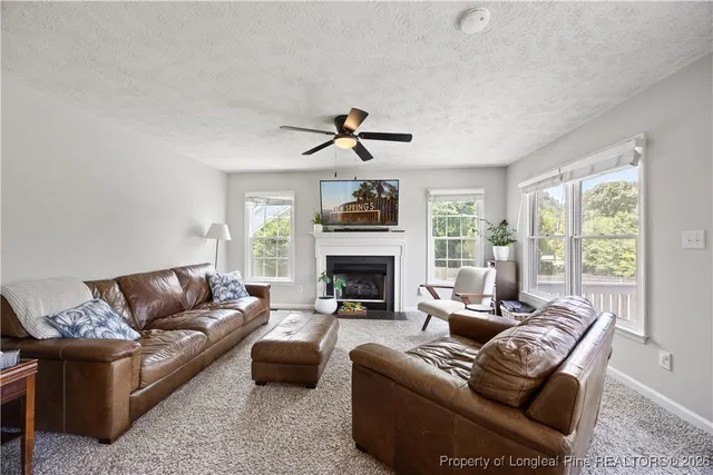 a bedroom with bed and wooden floor