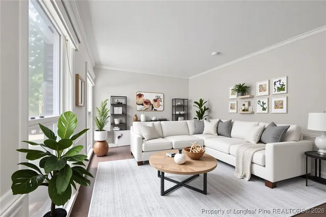 a kitchen with lots of counter top space and painting on the wall