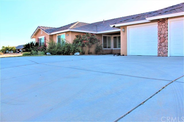 15834 Cheyenne Road Apple Valley, CA 92307 - Photo 1 of 1 a view of a house with a yard