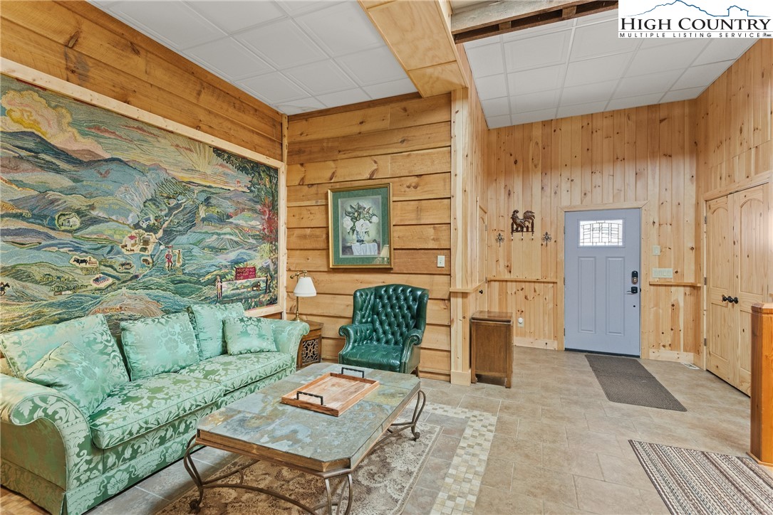 262 Lemly Road Fleetwood, NC 28626 - Photo 16 of 37 a outdoor living space with furniture and a rug