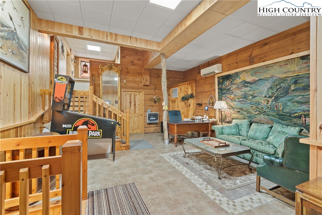 262 Lemly Road Fleetwood, NC 28626 - Photo 17 of 37 a backyard of a house with sofas fire pit and outdoor seating