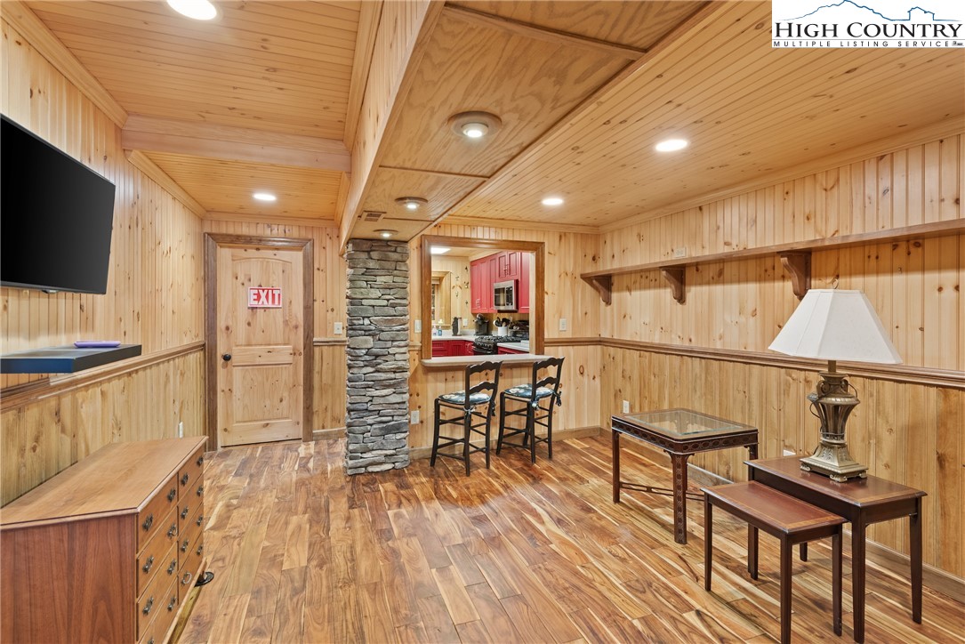 262 Lemly Road Fleetwood, NC 28626 - Photo 20 of 37 a view of a room with furniture and wooden floor