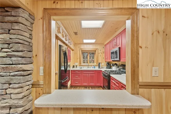 a view of a living room and utility room