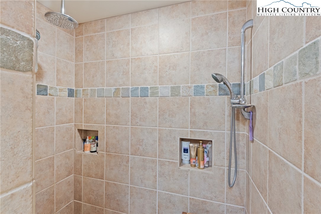 262 Lemly Road Fleetwood, NC 28626 - Photo 28 of 37 a bathroom with a shower