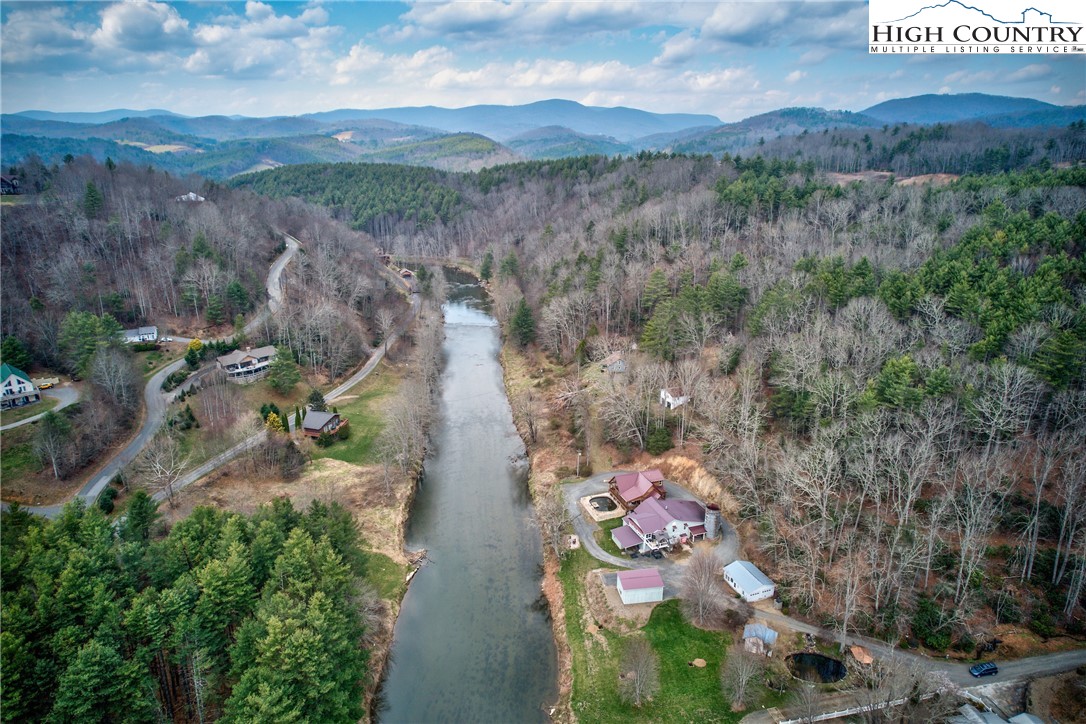 262 Lemly Road Fleetwood, NC 28626 - Photo 3 of 37 an aerial view of a house with yard