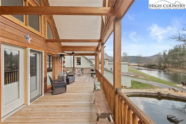 a view of a balcony with lake view and a ocean view