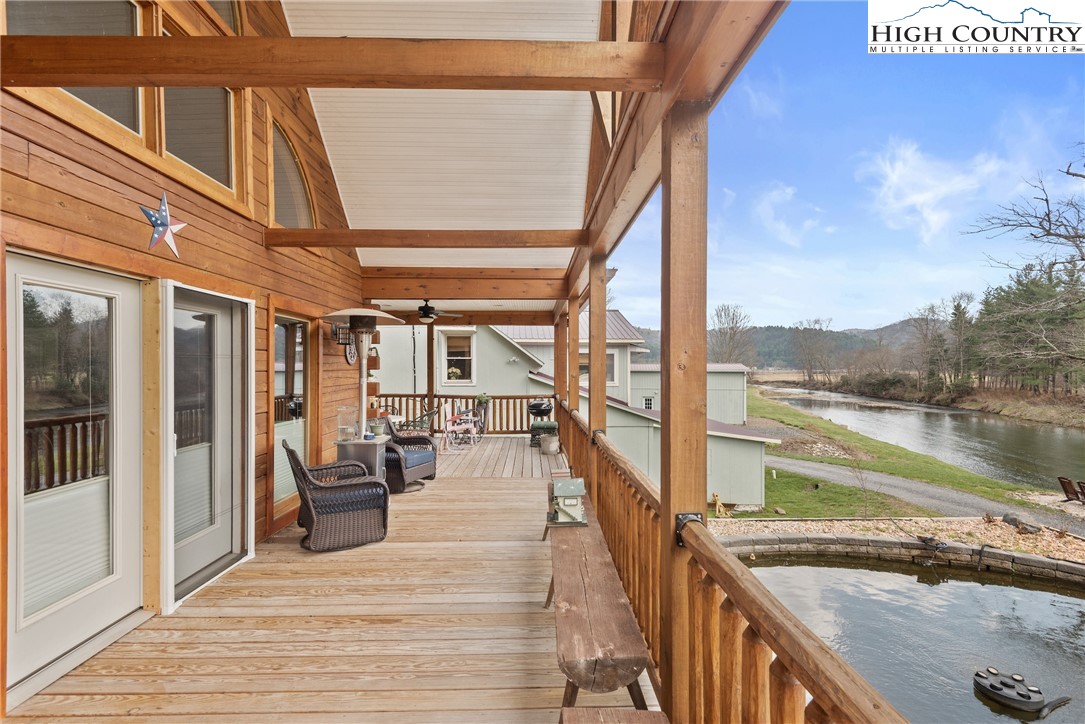 262 Lemly Road Fleetwood, NC 28626 - Photo 6 of 37 a view of a balcony with lake view and a ocean view